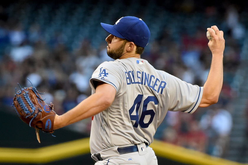 PHOENIX, AZ - JUNE 13: Mike Bolsinger #46 of the Los Angeles Dodgers delivers a first-inning pitch.