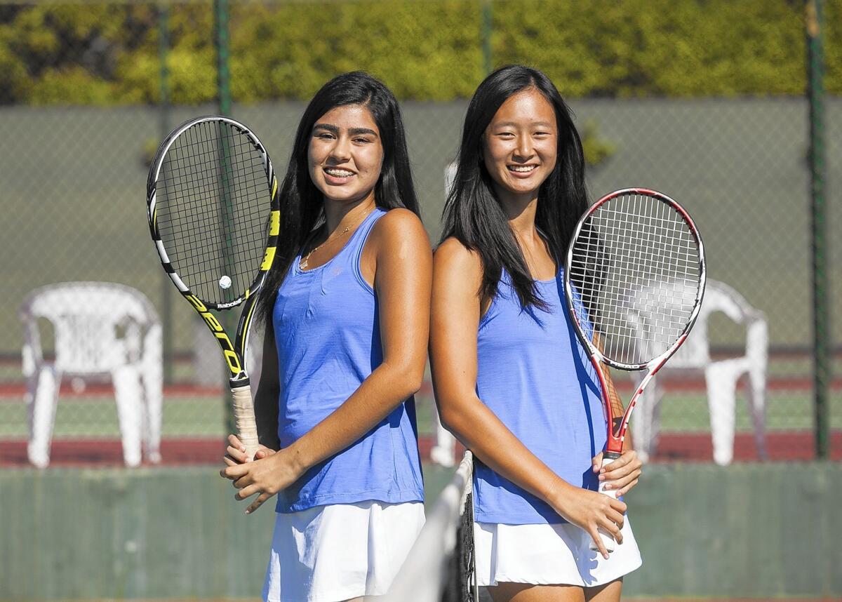 Corona del Mar High's doubles team of Camellia Edalat, left, and Erica Chen are 26-1 this season.