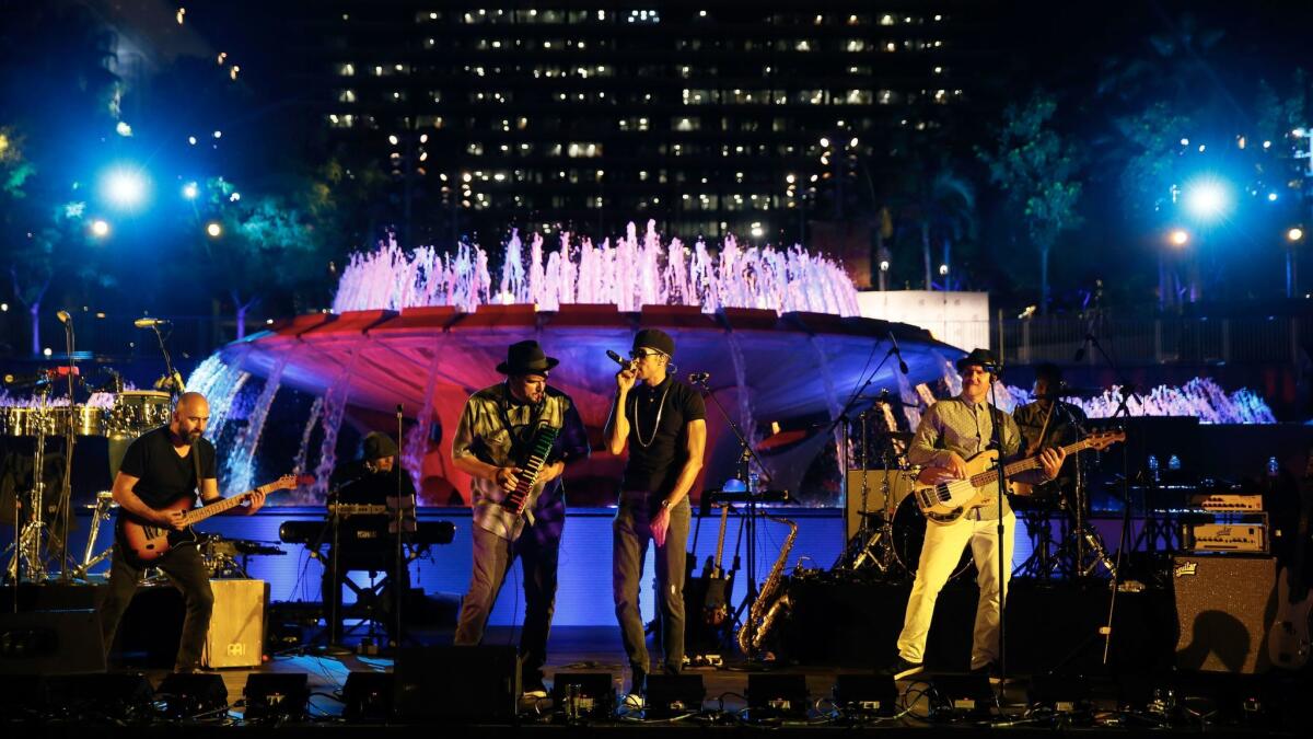 Ozomatli performs during part of Center Theatre Group's 50th anniversary celebration in Grand Park on May 20, 2017, in Los Angeles. (Ryan Miller / Capture Imaging)