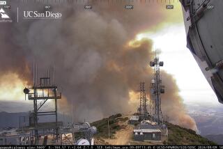 Smoke from the Airport Fire burning in Trabuco Canyon is seen from an ALERTCalifornia fire camera on Santiago Peak in Orange County on Sept. 9, 2024.