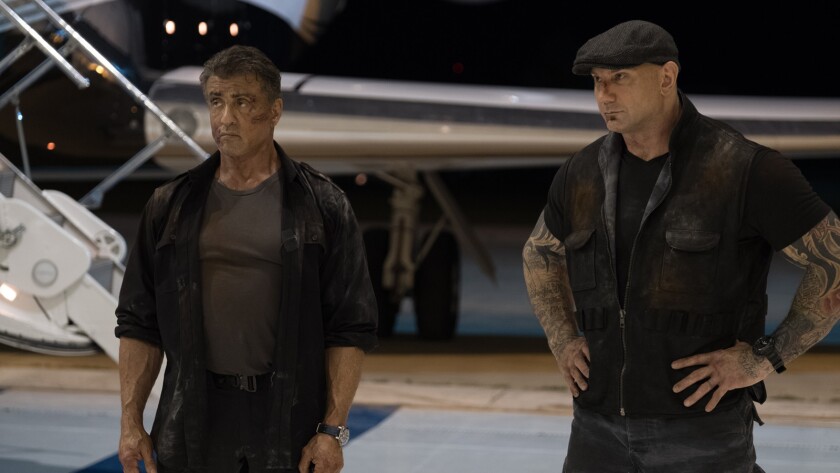 Sylvester Stallone, left, and Dave Bautista in the movie "Escape Plan: The Extractors."