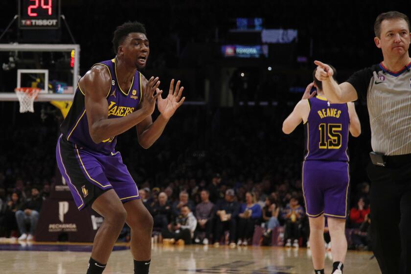 LOS ANGELES, CA - DECEMBER 23, 2022: Los Angeles Lakers center Thomas Bryant (31) pleads his case to the official after being called for goal tending against the Hornets at Crypto.com Arena on December 23, 2022 in Los Angeles, California. (Gina Ferazzi / Los Angeles Times)