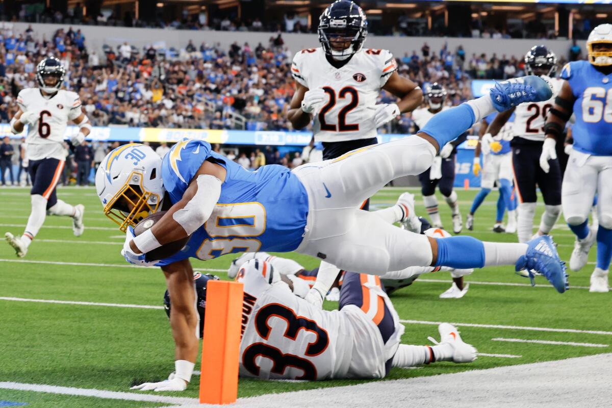 Chargers running back Austin Ekeler scores on a 39-yard catch-and-run in the first quarter.