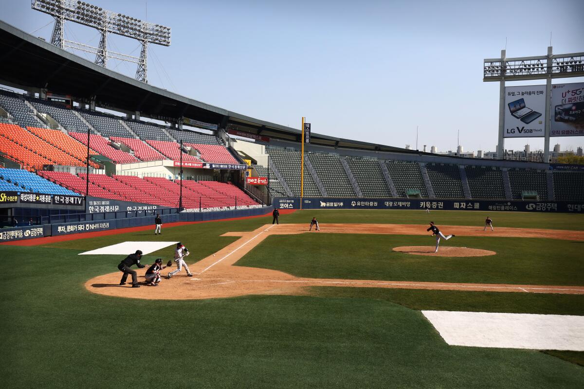 The LG Twins play an intrasquad game in an empty baseball stadium in Seoul on Sunday.