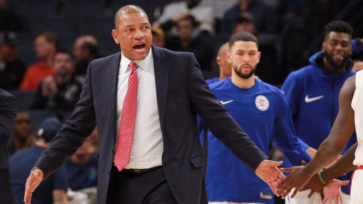 Clippers coach Doc Rivers reacts to a call in game against Minnesota.