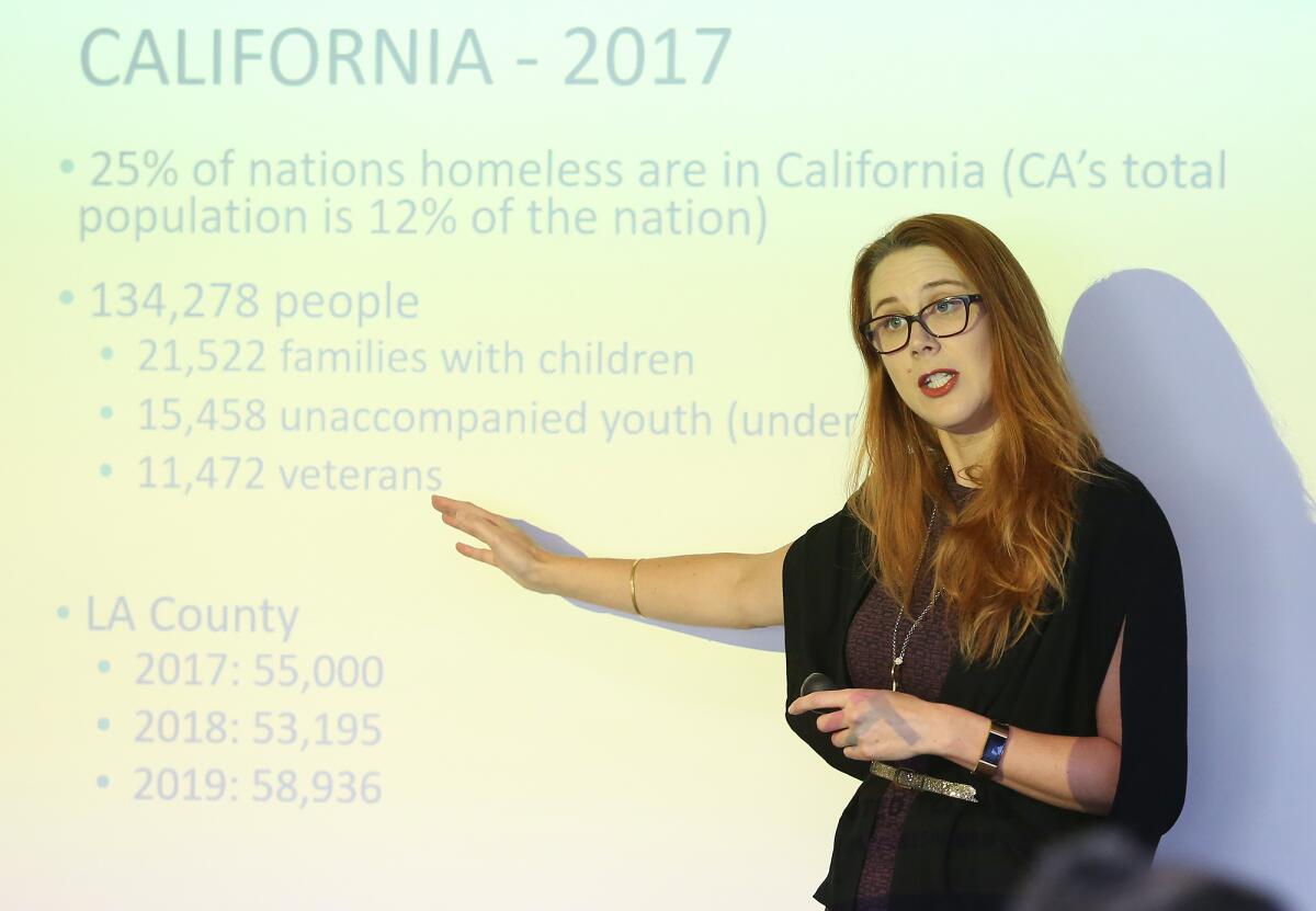 Becks Heyhoe, director of United to End Homelessness for Orange County United Way, conducts one of her periodic Homelessness 101 classes at the United Way office in Irvine.