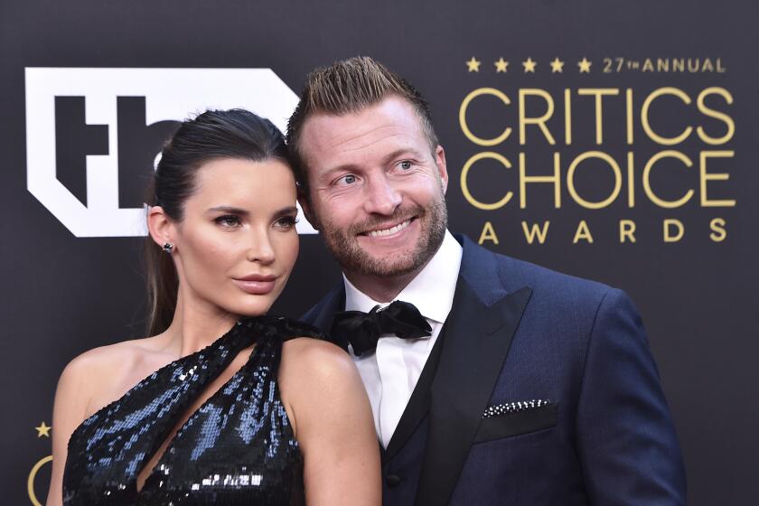 Veronika Khomyn, left, and Sean McVay arrive at the  Critics Choice Awards on March 13, 2022.