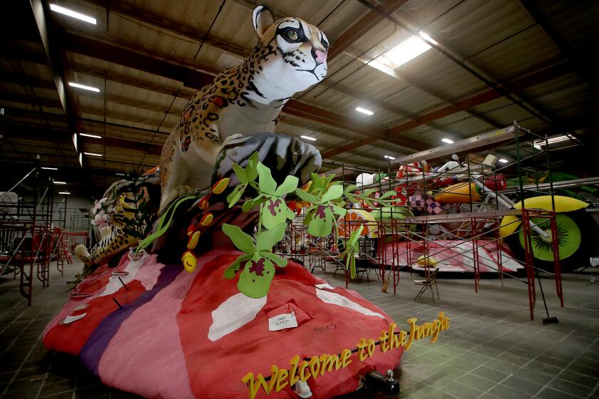 IRWINDALE, CALIF. - DEC. 19, 2022. Pasadena Rose Parade floats are prepped for floral decorations at the Phoenix Decorating Company prep Pasadena Rose Parade floats at the company's facilities in Irwindale on Monday, Dec. 19, 2022. Rising inflation is having an impact on the parade's float-builders as volunteers struggle to raise funds for the larger-than-life floats that will file down Colorado Boulevard on Jan. 2, 2023. (Luis Sinco / Los Angeles Times)
