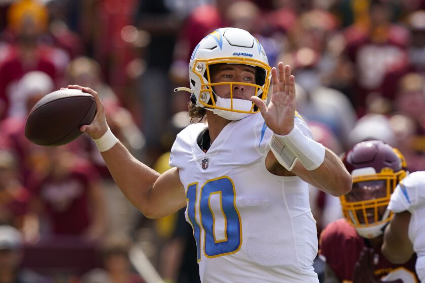 Los Angeles Chargers quarterback Justin Herbert (10) throws the ball against the Washington Football Team.