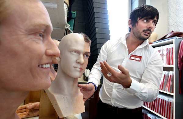 Colin Thomas, general manager of Madame Tussauds Hollywood, gives a tour of The Studio, which contains spare body parts for the museum's many celebrity wax sculptures. At left are figures of Conan O'Brien and Justin Timberlake.