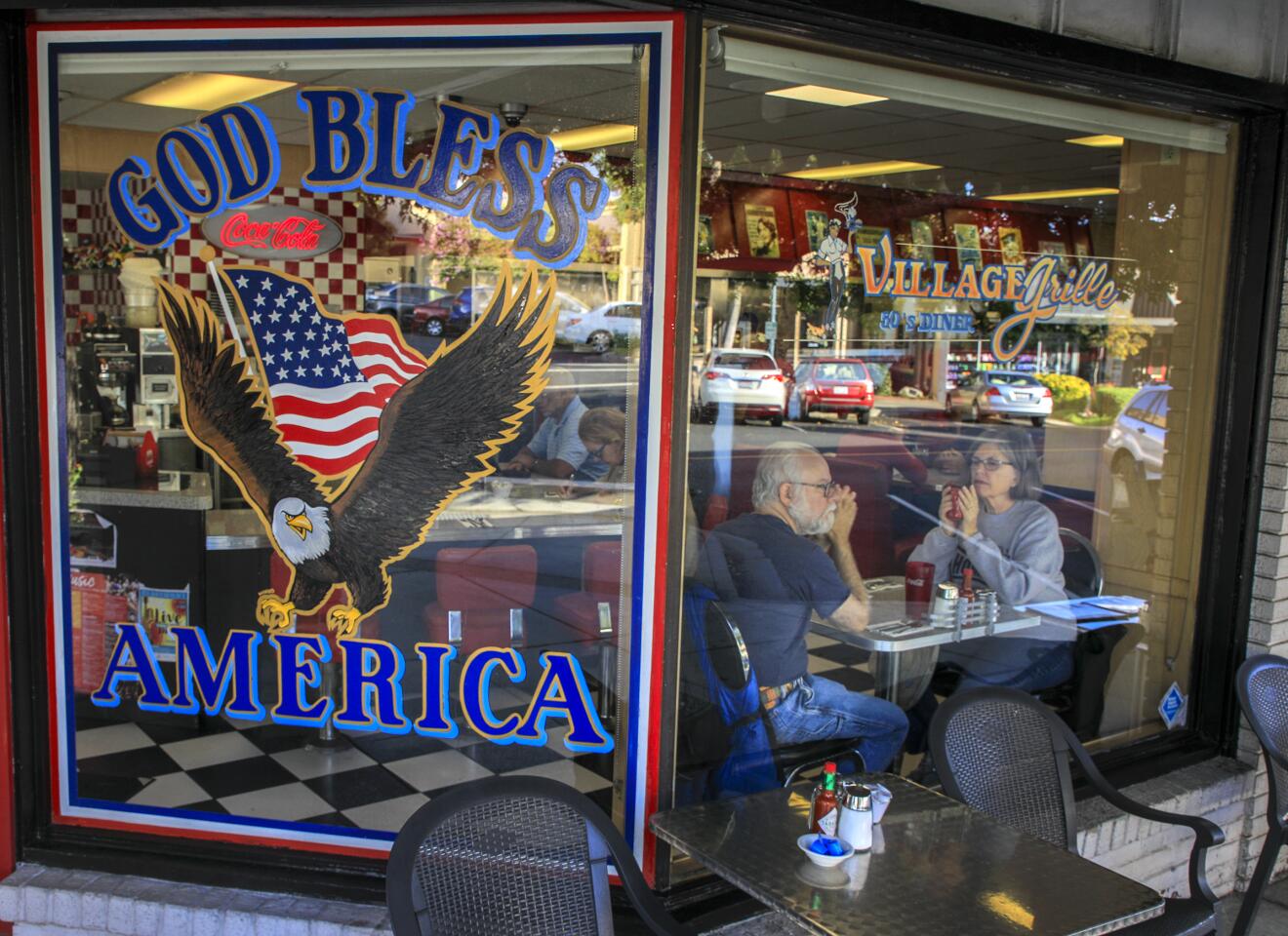 A very patriotic message greets the customers at the Village Grill , a '50s diner in Claremont Village.