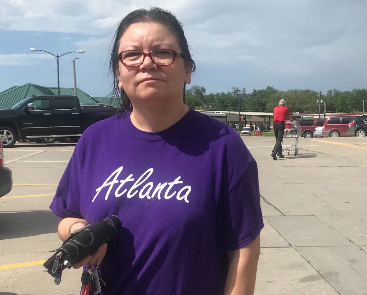 LeAnn Davis of Toledo, Iowa, says President Trump has pushed to reopen the economy from coronavirus restrictions too soon. A former Barack Obama supporter who, like many Iowa Democrats, didn't vote for Hillary Clinton in 2016, she says she'll vote this year for Joe Biden.