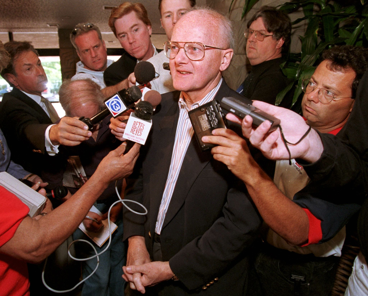 Kansas City Chiefs owner Lamar Hunt speaks to reporters at the NFL's annual meeting in March 1999.