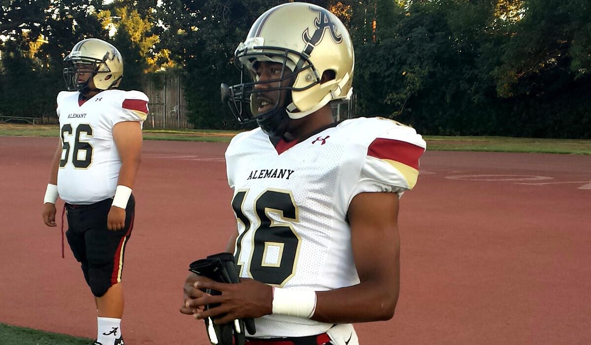 Alemany running back Dominic Davis prepares to warm up before a game against Dorsey on Friday night.