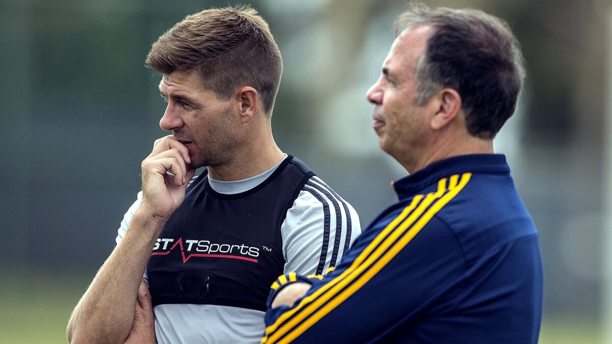 Midfielder Steven Gerrard and Coach Bruce Arena at a training session for the Galaxy on July 9 at StubHub Center.