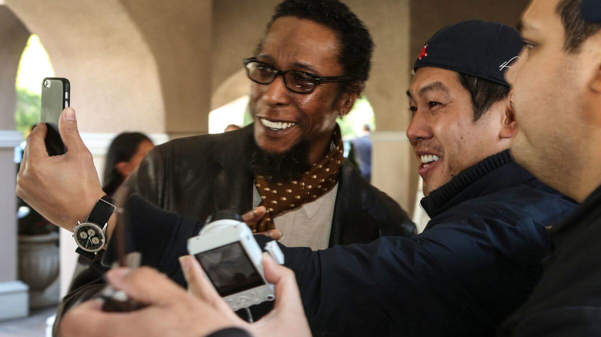 Actor Ron Cephas Jones from NBC's "This Is Us," signs autographs and poses for pictures.