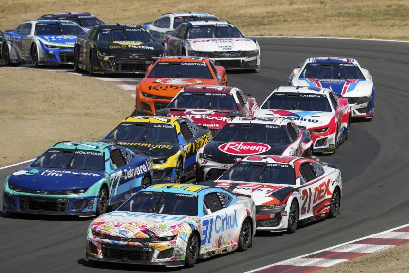Drivers make their way through the track during a NASCAR Cup Series auto race at Sonoma Raceway, Sunday, June 9, 2024, in Sonoma, Calif. (AP Photo/Godofredo A. Vásquez)