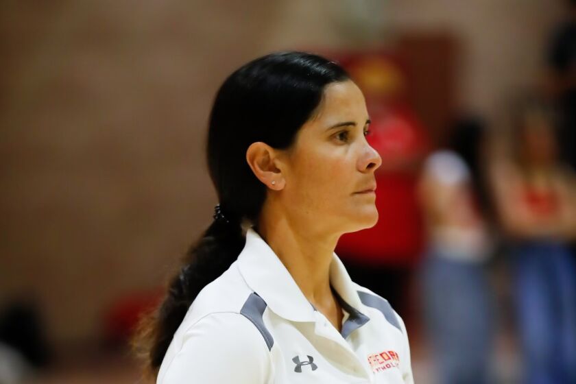 Coach Juliana Conn led Cathedral Catholic to an undefeated season in girls volleyball.