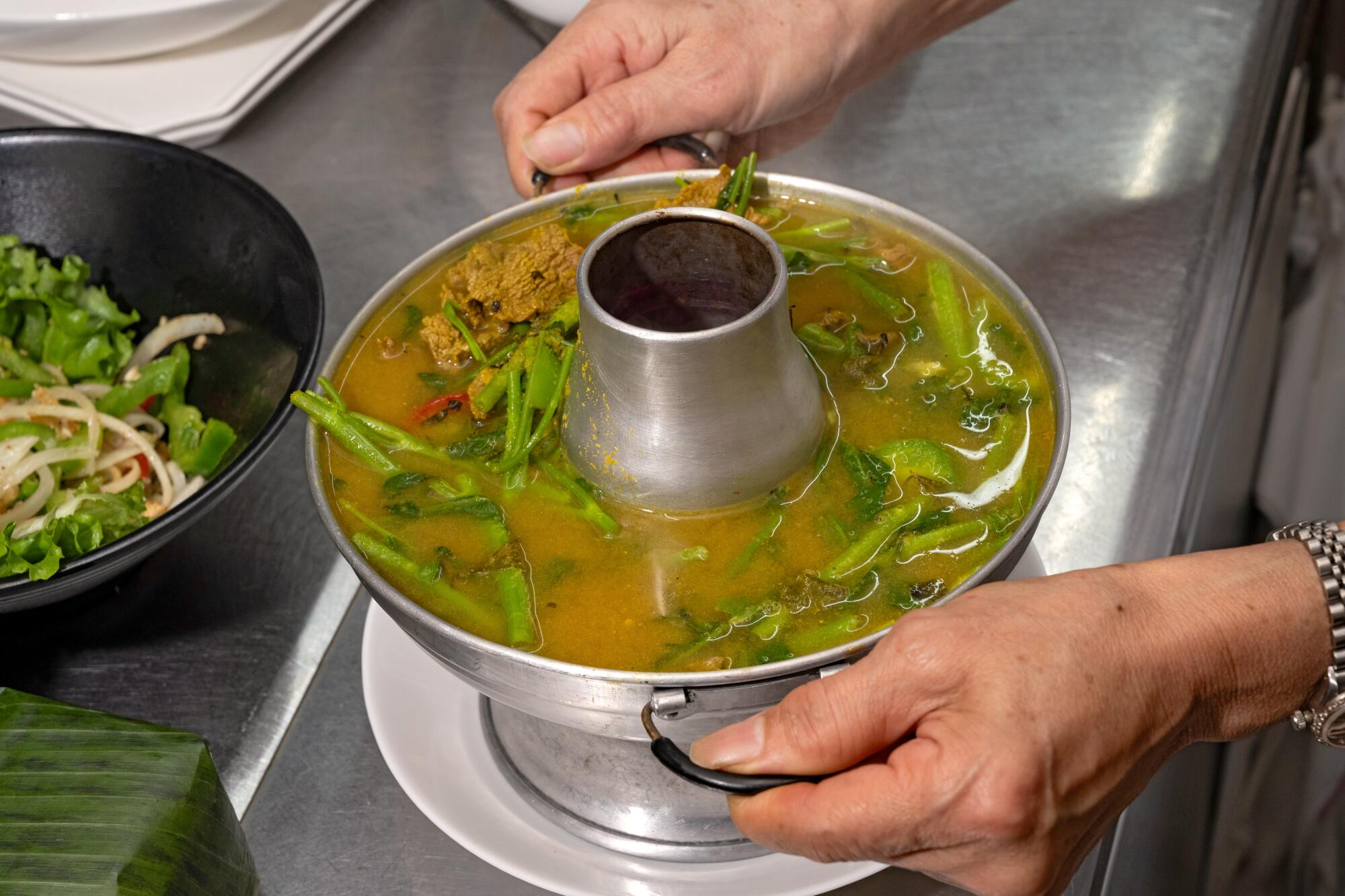 Somlaw Machu Kreoung soup in a metal pot