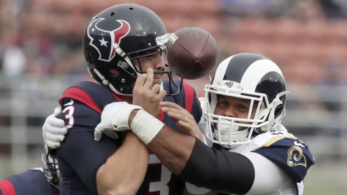 Rams defensive lineman Aaron Donald, knocking the ball from Texans quarterback Tom Savage for a fumble on one of his 11 sacks, might sit out the season finale Sunday.