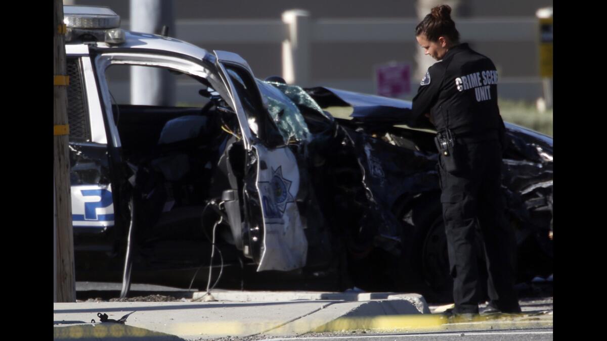 An investigation is underway in Ontario, where a San Bernardino police officer was killed early Thursday after his squad car was broadsided by another vehicle at Fourth Street and Etiwanda Avenue.