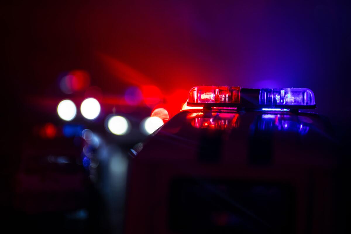 Police cars at night.