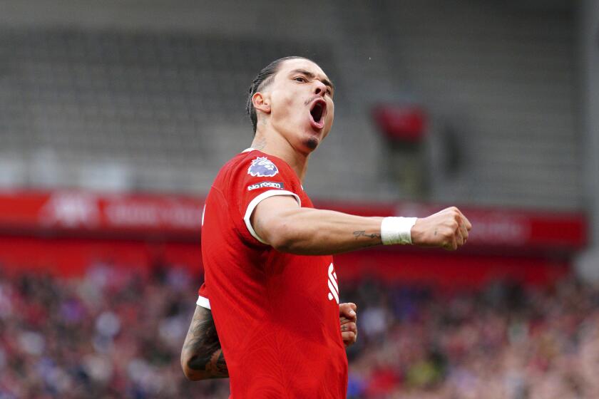 Liverpool's Darwin Nunez celebrates scoring his side's second goal of the game during the English Premier League soccer match between Liverpool and West Ham at the Anfield stadium in Liverpool, England, Sunday, Sept. 24, 2023. (Peter Byrne/PA via AP)