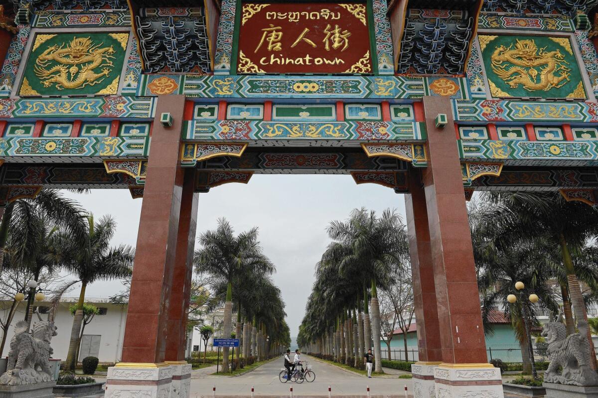 The gateway to Chinatown in a special economic zone in Ton Pheung, northwestern Laos. Most of the zone’s 4,500 workers are Chinese.