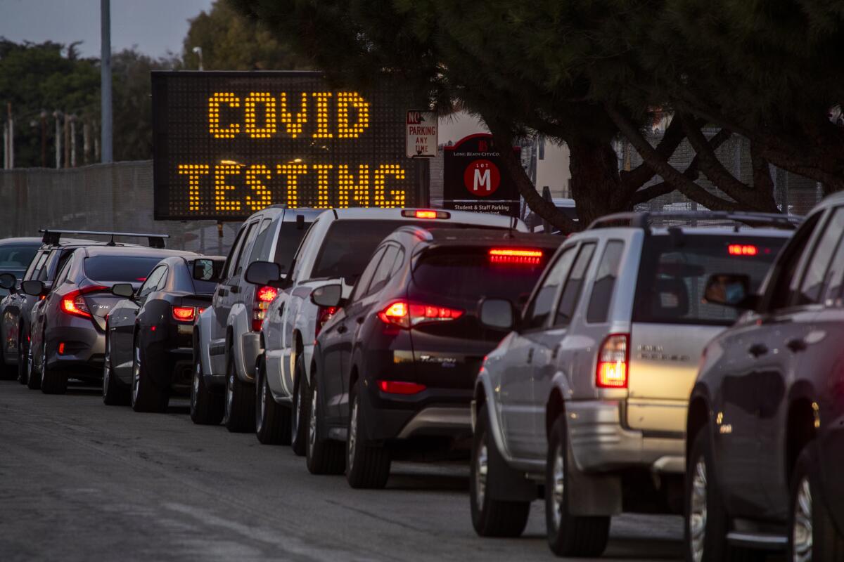 A long line of vehicles outside a COVID-19 testing site at Long Beach City College on Dec. 9. 