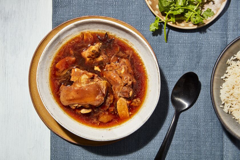 LOS ANGELES, CALIFORNIA, JULY 28, 2021: Braised Pig Trotters with Lemon and Star Anise for the August Week of Meals story by Ben Mims, photographed on Wednesday, July 28, 2021, at Proplink Studios in Arts District Los Angeles. (Silvia Razgova / For The Times) ATTN: 815461-la-fo-week-of-meals-august-2021