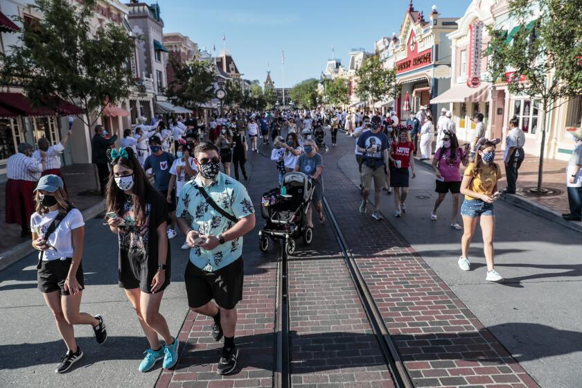 Anaheim, CA, Friday, April 30, 2021 - A limited number of people come to Disneyland the first day after closing more than a year ago. (Robert Gauthier/Los Angeles Times)