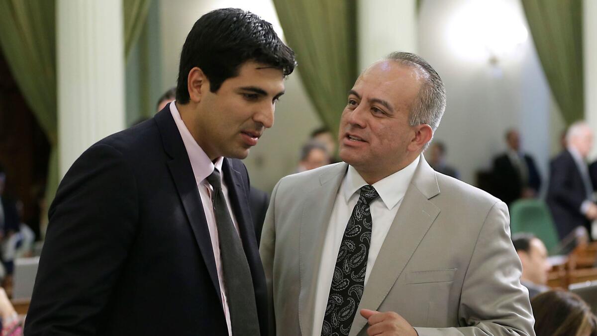 Assemblyman Matt Dababneh is seen in 2014 with Raul Bocanegra, who resigned from the Assembly last week.