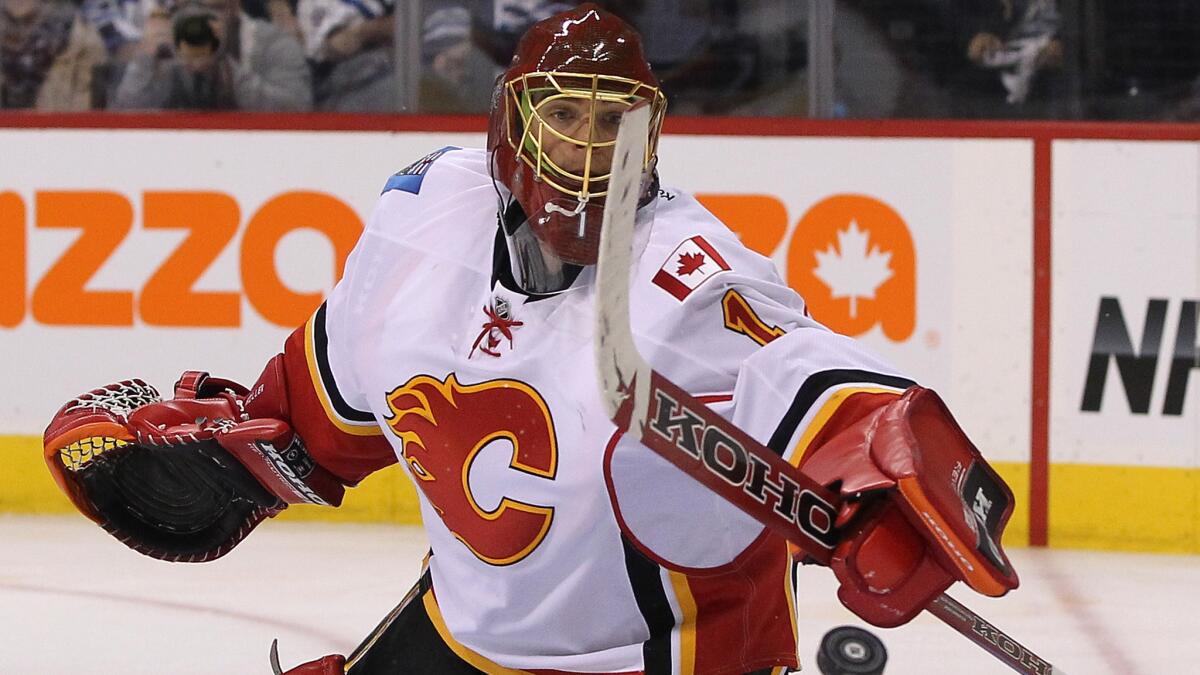 Calgary Flames goalie Jonas Hiller makes a save during a game against the Winnipeg Jets in October.