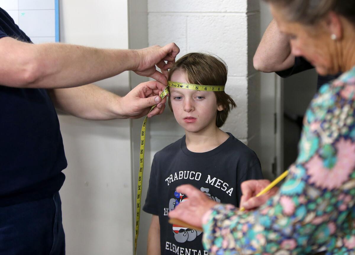 Kailer Riley has his head measured during the Pageant of the Masters open casting call Friday night for the 2020 show, called "Made in America."