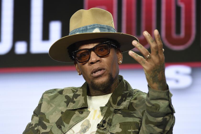 FILE - In this Wednesday, Feb. 13, 2019, file photo, D.L. Hughley speaks during TV One's "Uncensored" and "The D.L. Hughley Show" panel during the Winter Television Critics Association Press Tour in Pasadena, Calif. Hughley has announced he's tested positive for COVID-19, following his collapse onstage during a performance in Nashville, Tenn., on Friday, June 19, 2020. (Photo by Chris Pizzello/Invision/AP, File)