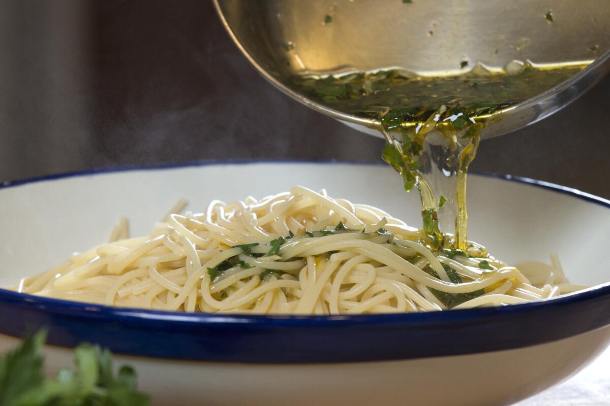 Chef Evan Kleiman makes aglio e olio, a simple pasta dish with olive oil, garlic, lemon, pepper flakes and parsley.