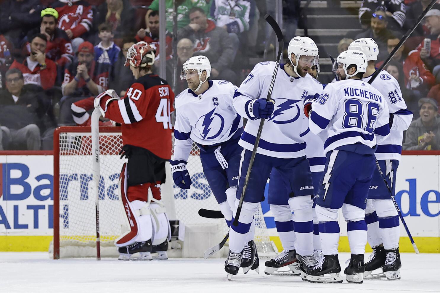 Jack Hughes has 2 goals and 2 assists as Devils top Islanders 5-4 in OT, National