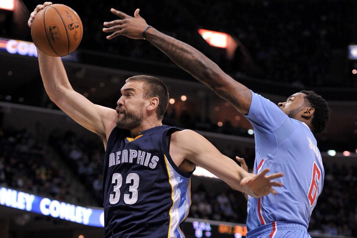 Grizzlies center Marc Gasol battles the Clippers' DeAndre Jordan for a rebound during their game in Memphis on Nov. 23.