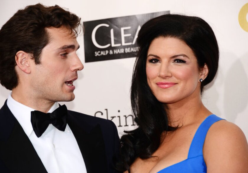 Henry Cavill and Gina Carano arrive, together, at the Critics' Choice Awards in January.