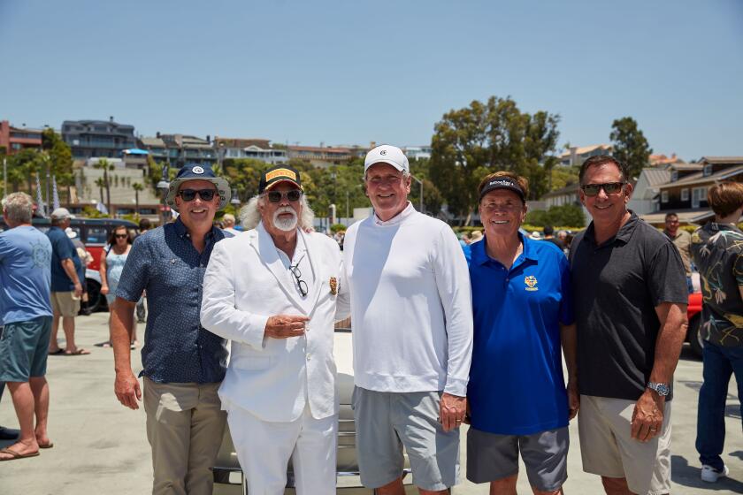 Todd Pickup, John Wortmann, Joe Moody, Mark Larson and Bill Blaise, all governors of the Balboa Bay Club, attend and support the 2024 Car Show, which attracted a crowd of some 2,000 guests in the community.