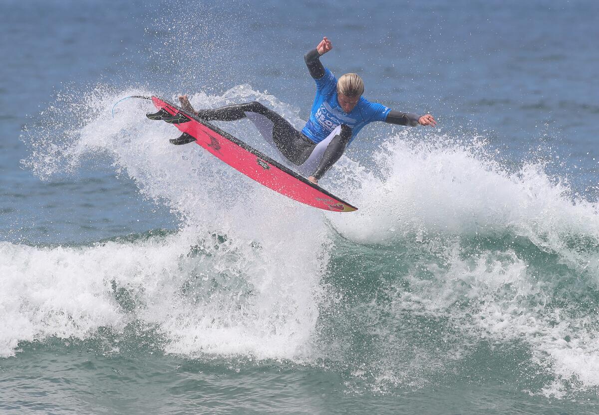 Kolohe Andino of San Clemente completes a high scoring air-reverse.