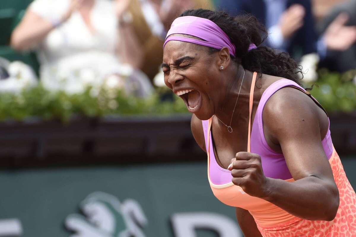Serena Williams celebrates after winning her match Thursday against Germany's Anna-Lena Friedsam.