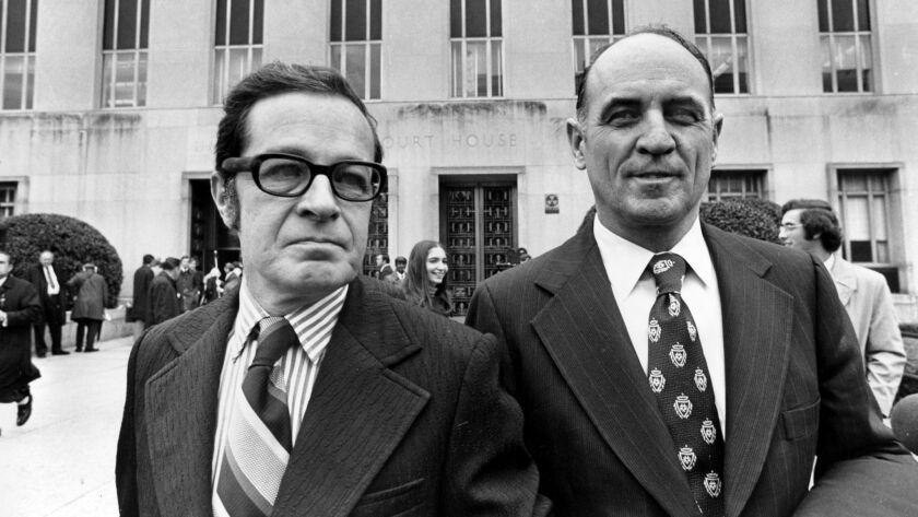 James W. McCord Jr., right, former security chief for President Nixon's reelection committee, and his attorney Bernard Fensterwald leave U.S. District Court in Washington in 1973.