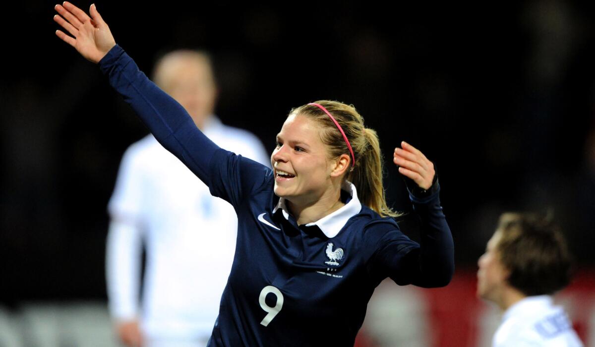 France forward Eugenie Le Sommer celebrates after scoring against the U.S. in an exhibition game Sunday.