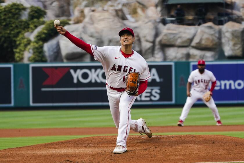 Mike Moustakas' three-run homer powers Shohei Ohtani, Angels to win - Los  Angeles Times