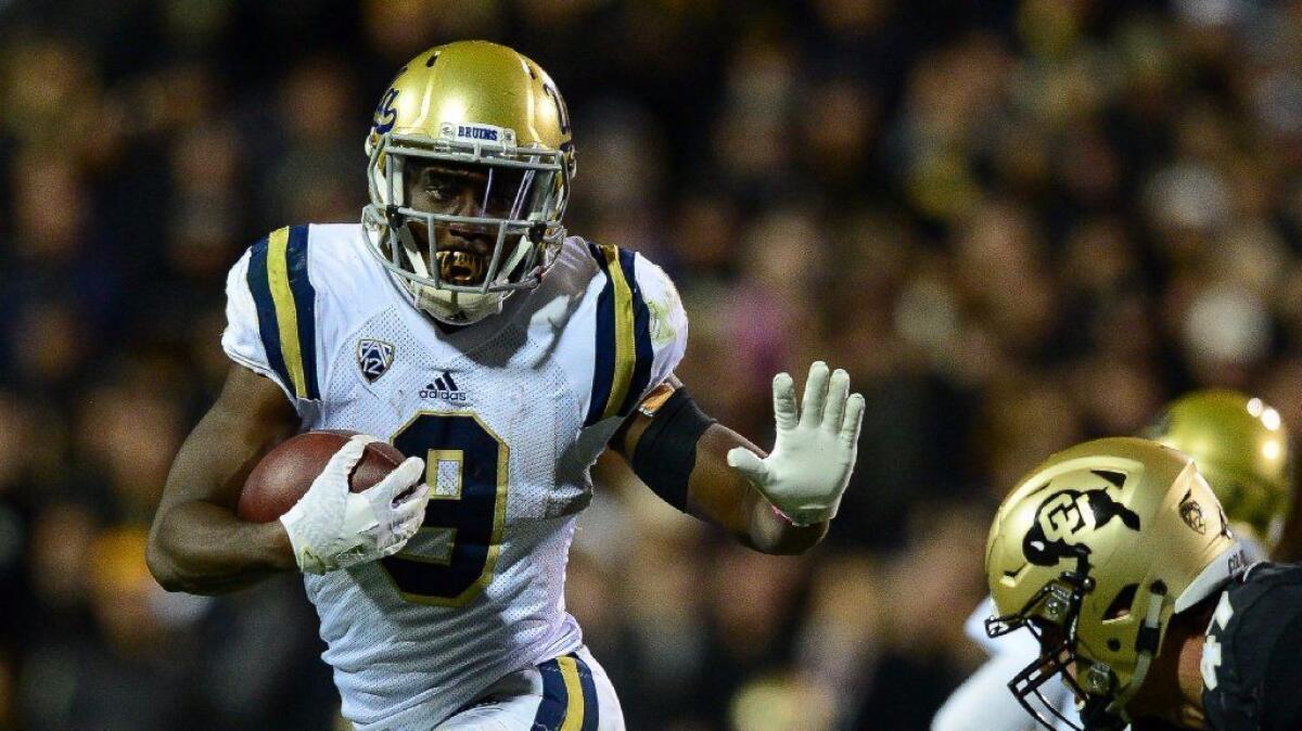 UCLA running back Soso Jamabo carries the ball against Colorado during the Bruins' 20-10 loss to the Buffaloes on Nov. 3.