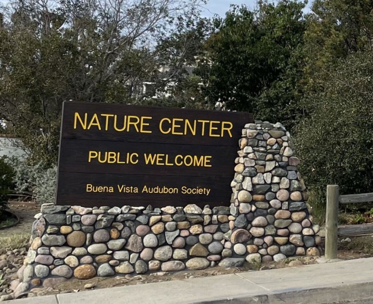 A new redwood sign is up at the entrance to the Buena Vista Lagoon Nature Center