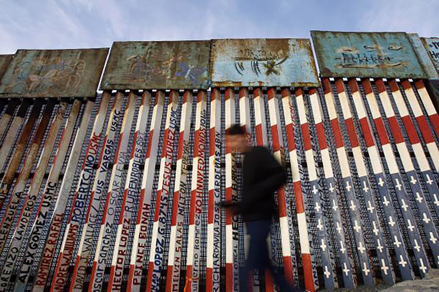 Along populated areas, the border wall is filled with murals, graffiti and other forms of art