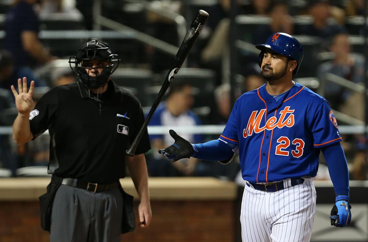 Adrian Gonzalez #23 of the New York Mets flips his bat after striking out against the New York Yankees during the fourth inning of a game at Citi Field on June 10, 2018 in the Flushing neighborhood of the Queens borough of New York City.