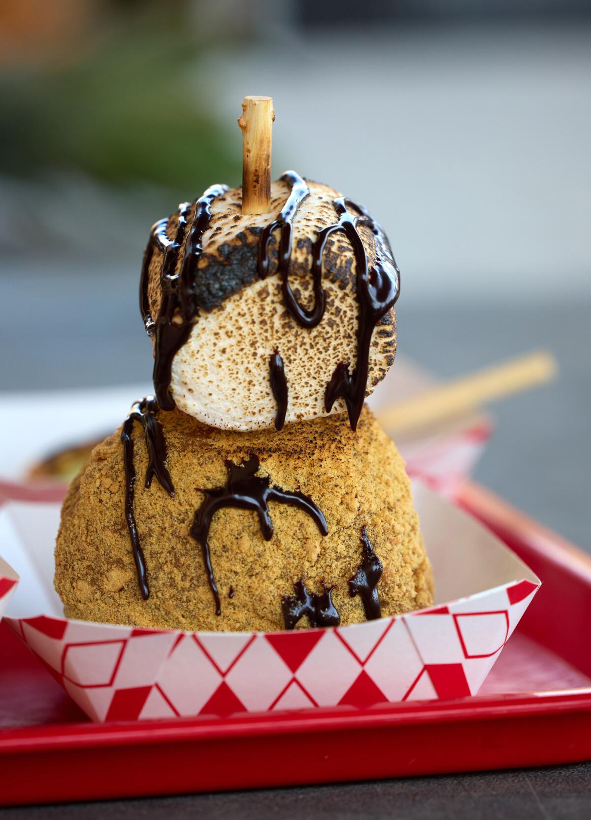 The S'mores Caramel Apple from the Candyland booth at the 2023 San Diego County Fair.  